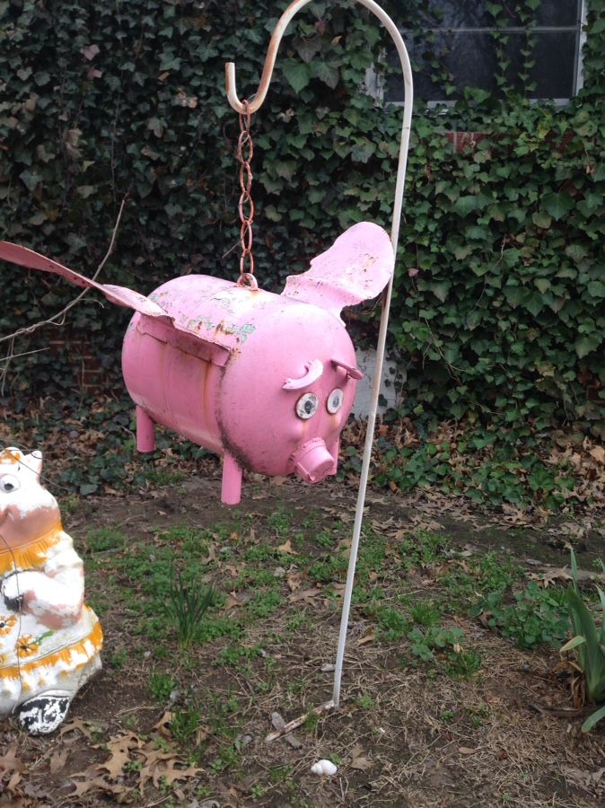 Flying pig lawn ornament