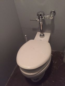 Kohler Toilet-rear discharge, no digging required , medicine cabinet