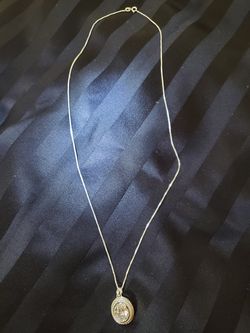 Sterling Silver Necklace with beautiful emerald cut crystal pendant