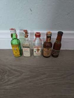 5 vintage mini airplane shooter liquor bottles