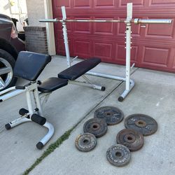 Squad rack and adjustable bench bar and weights 35 25 10