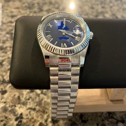 Men’s luxury watch. brand new. Silver with blue dial.