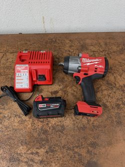 📌Milwaukee M18 FUEL 18V Lithium-Ion Brushless Cordless 1/2 in. Impact Wrench w/Friction Ring Kit w/One 5.0 Ah Battery)👉PRECIO FIRME 👉$ libr