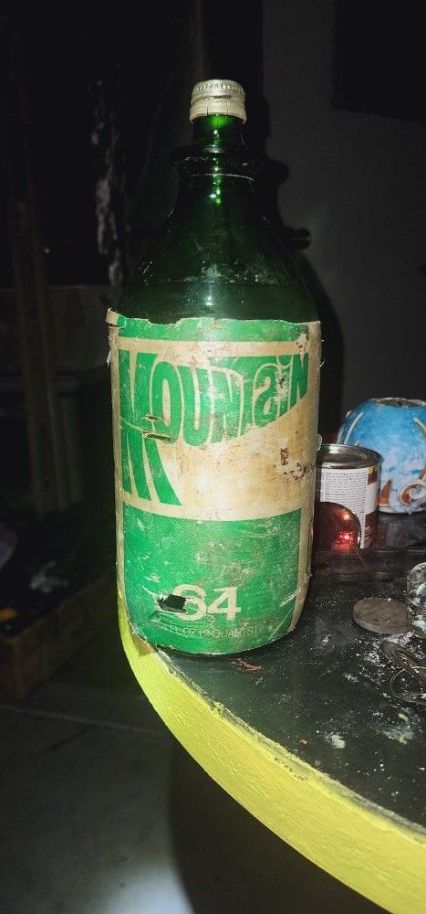 Antique   64oz Mountain  Dew Bottle 