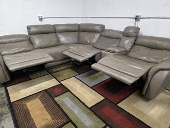 Power Leather reclining sectional
Delivery and Setup options available