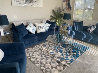 Living room set with coffee and end tables .