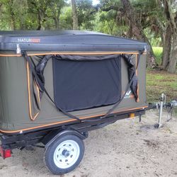 Camper with trailer