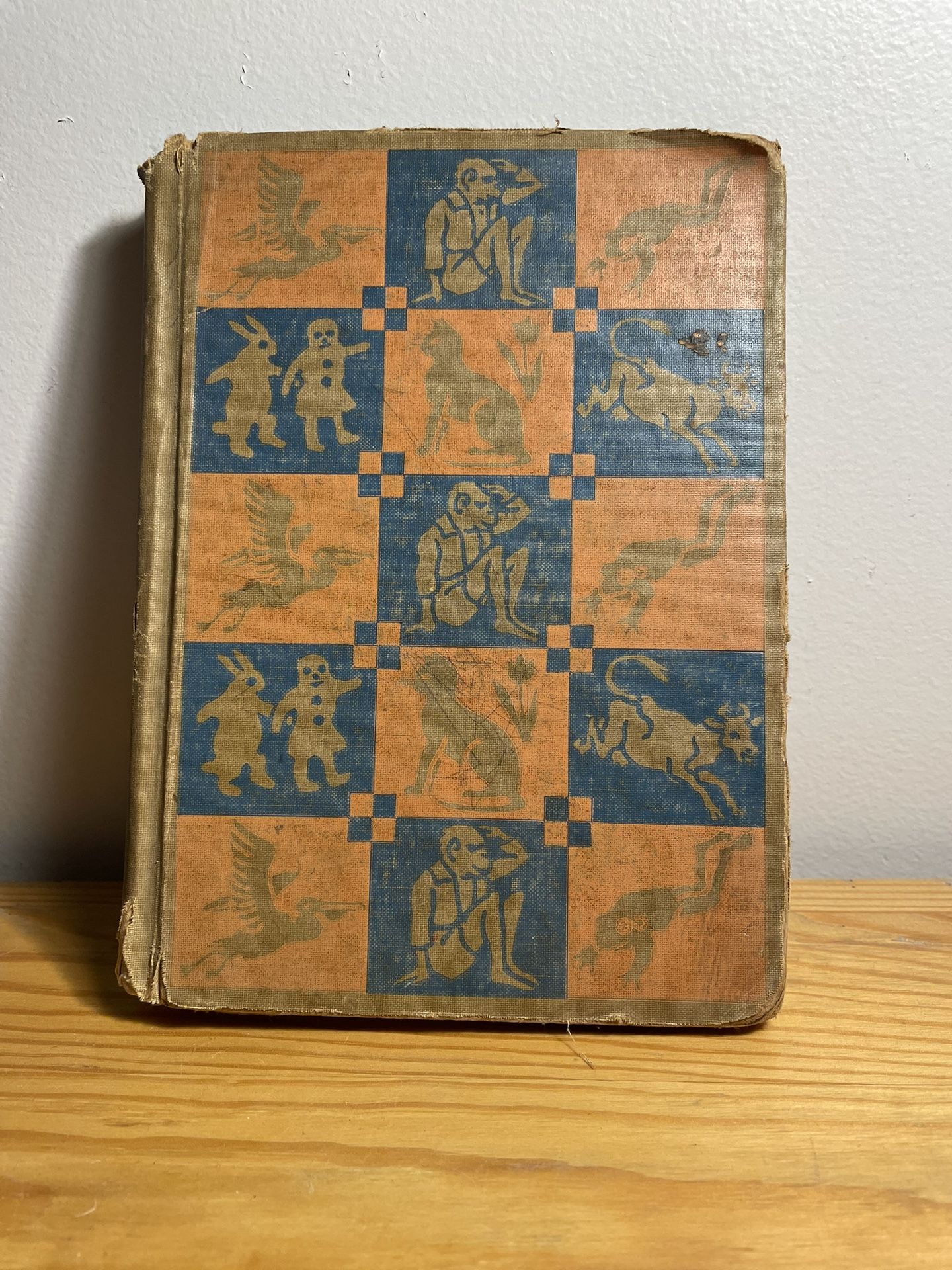 vintage children's book titled "Children's Bookshelf-Playing Together" from 1934