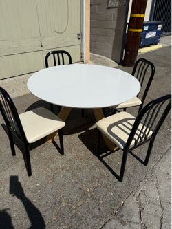 Round dining table with four chairs 47 1/2 x 30 height