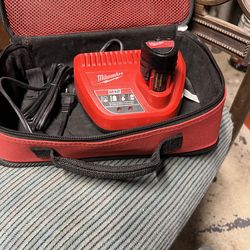Milwaukee charger & 2 batteries