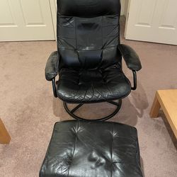 Leather chair with footrest
