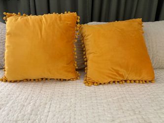 Yellow decorative pillows