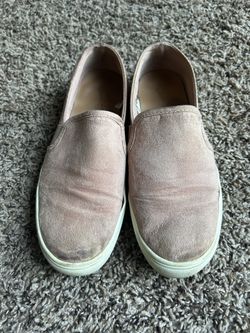 Pink target slip on shoes