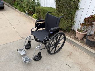 Invacare Wheelchair with Footrests