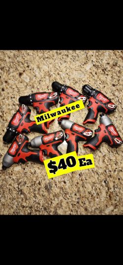 Milwaukee  M12 Battery And Impact Drill 