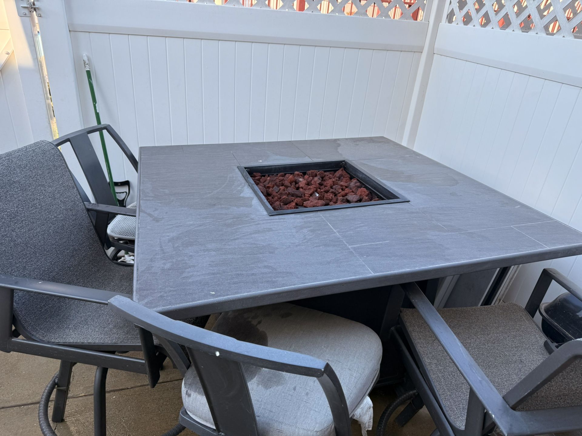 Fire pit table with propane tank