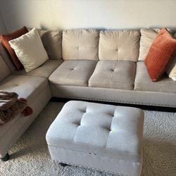 Beige sofa and ottoman 