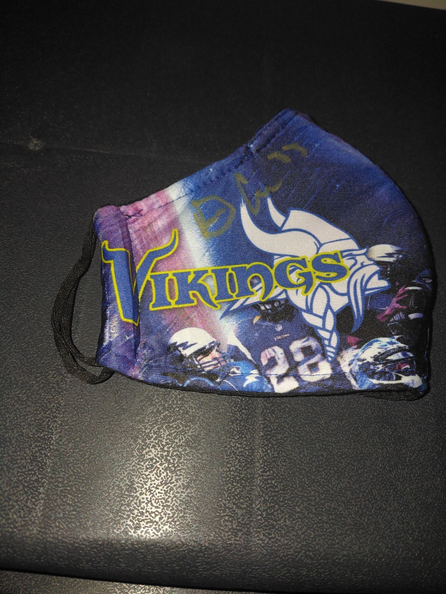 Exclusive face mask signed by famous running back Dalvin Cook