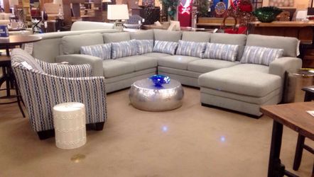 Brand new gray sectional W/ sleeper & Storage and accent chair