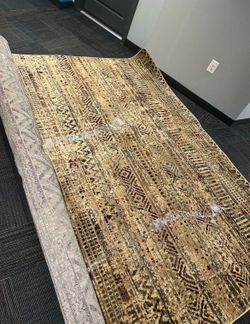 NEW 10x13 RUG.