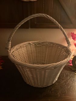 Woven wicker and willow handle basket,
