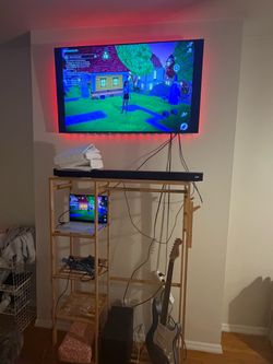 Samsung TV with soundbar and subwoofer