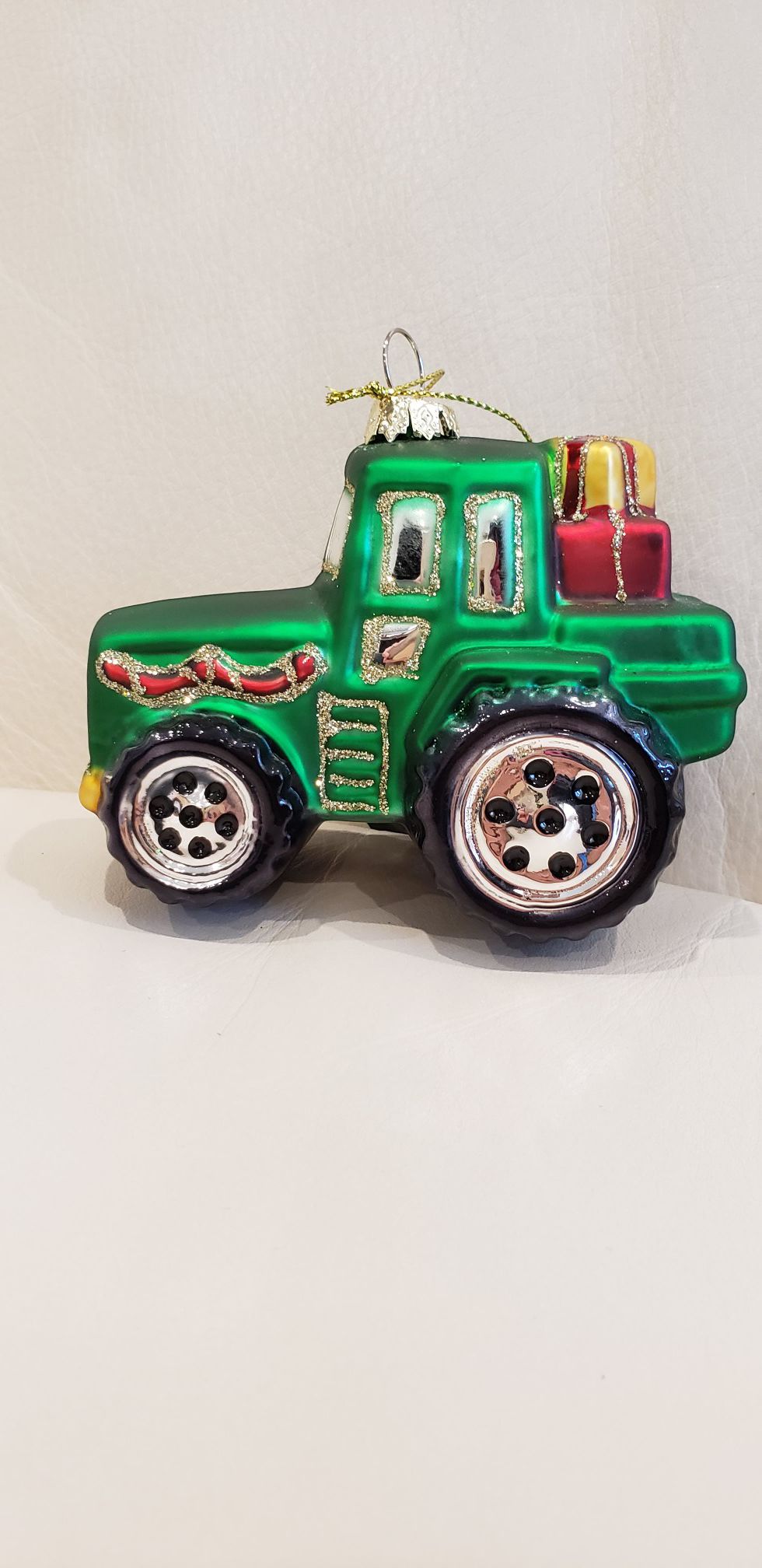 Green Farm Tractor Christmas tree ornament decoration 4x3" high quality glass tractor ornament with sparkles carrying presents. Brand new with tags
