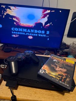PlayStation 2 Console with Controller and Game