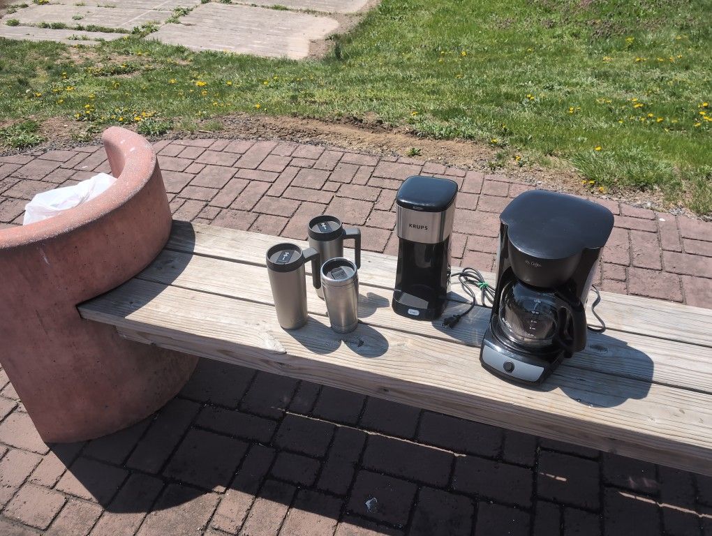 Two Coffee Makers And Cups