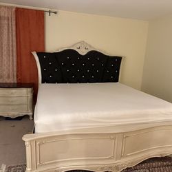 Elegant White Bed Frame with Black Tufted Headboard
