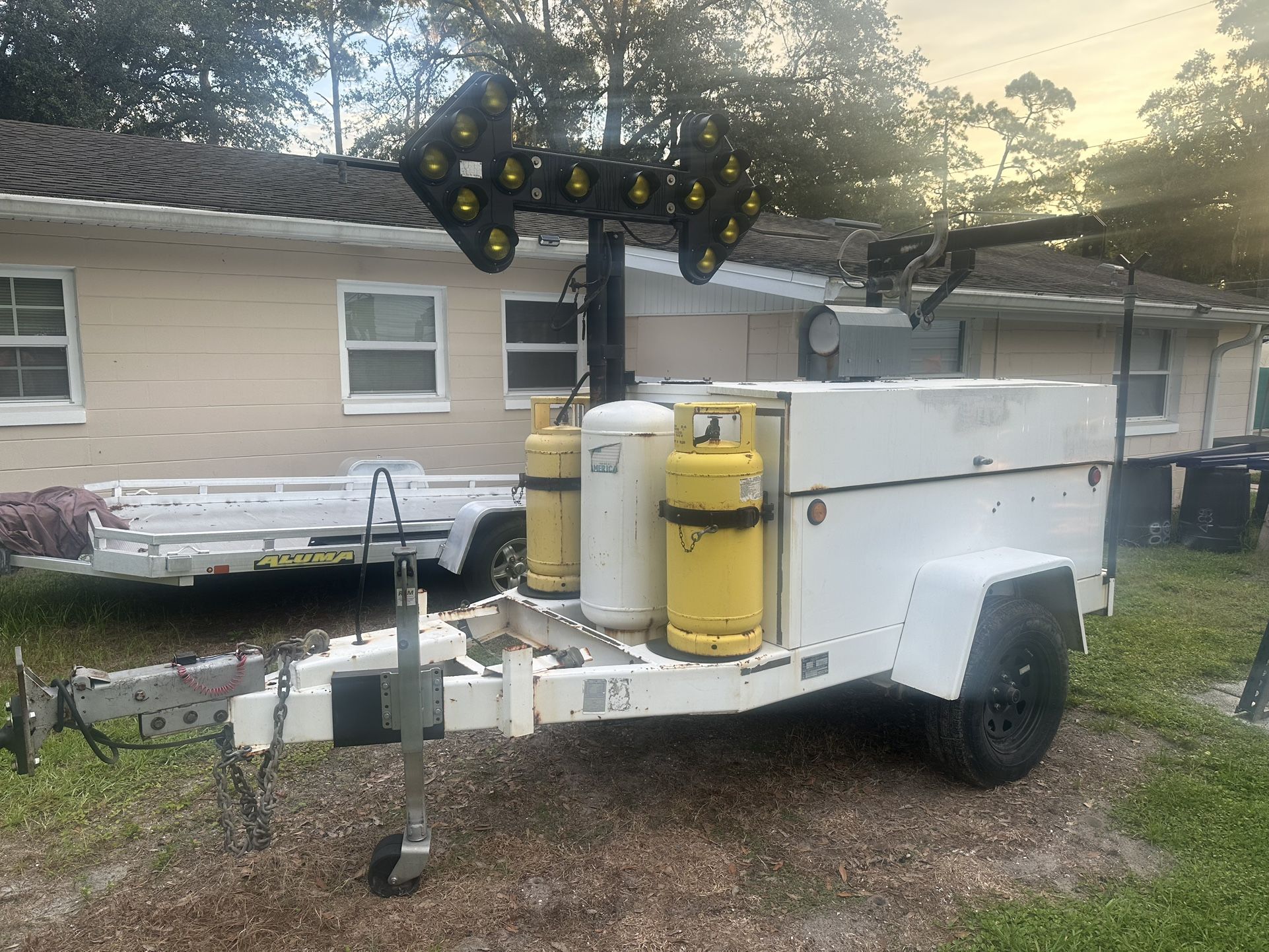 12.5 kw Generator, air compressor, (2) air hose reels, air line dryers, blower, arrow board, crane/winch