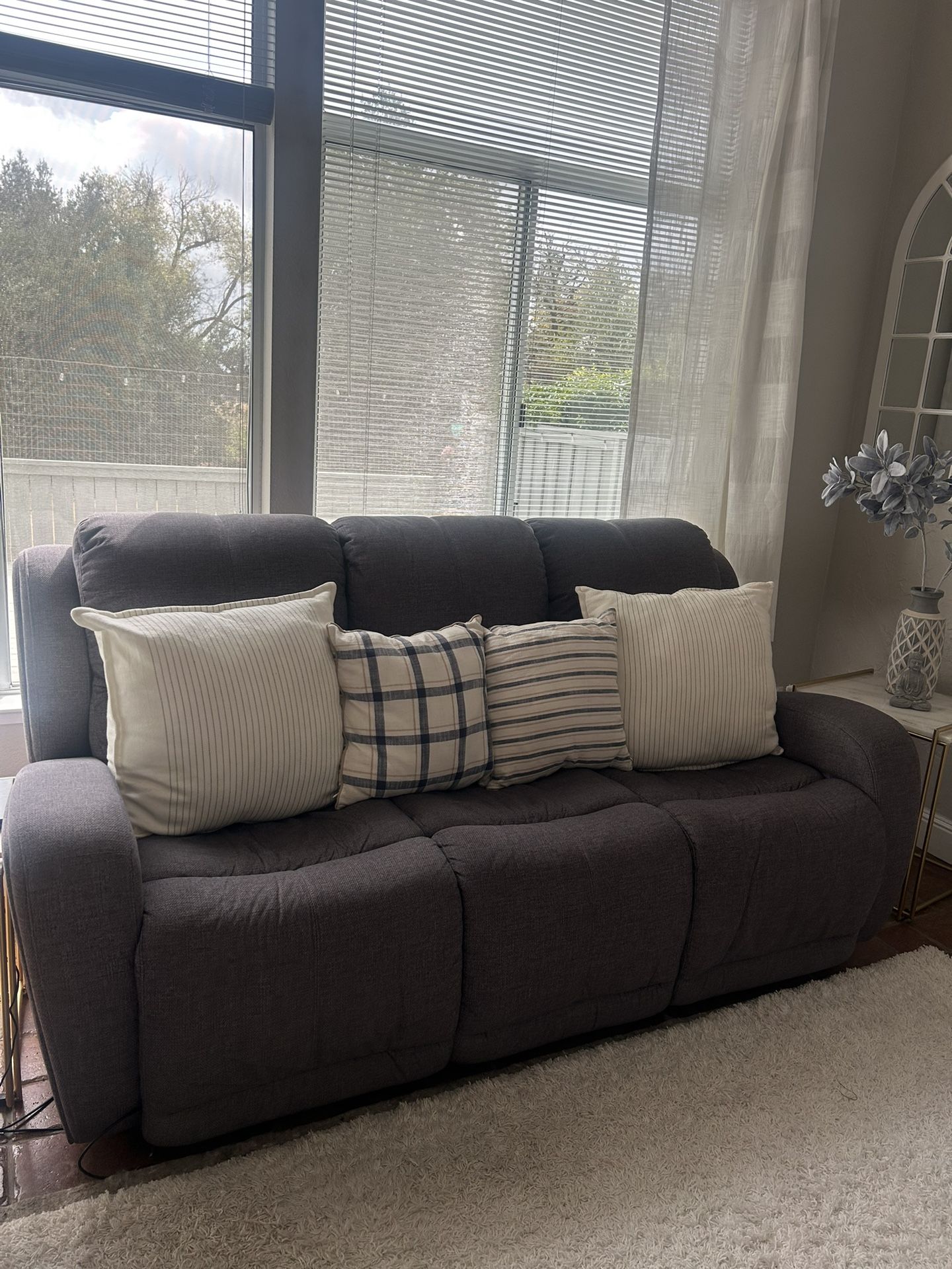 Living Spaces Recliner Couch + Loveseat. Has in-built USB charging. 