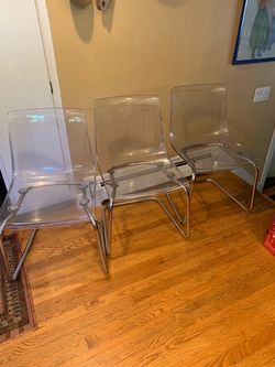 3 acrylic and chrome chairs
