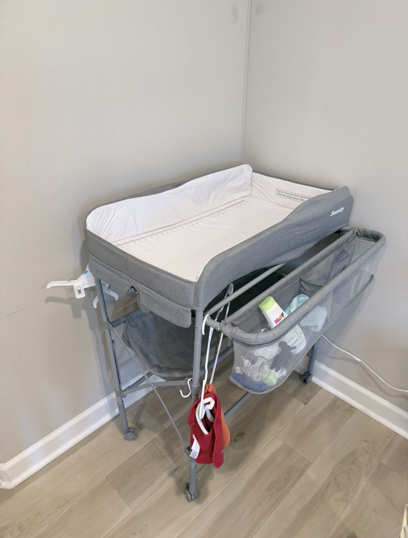 Sweeby Portable Baby Changing Table - Folding, with Storage & Wheels (Like New)