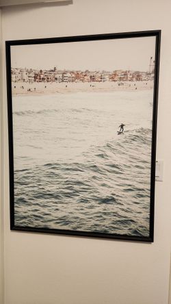 Surfer on beach canvas photo