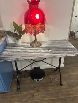 Gray and black marble table