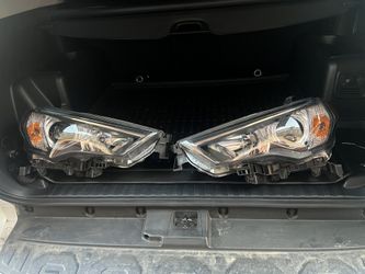 Like Brand New Toyota 4Runner OEM Head Lights With  LED  Bulbs$600 OBO 