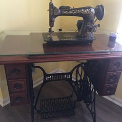 Antique Singer Sewing Machine in refurbished oak cabinet