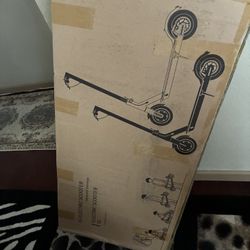 Brand New Electric Scooter In Box ( Lower Prices Are Negotiable)