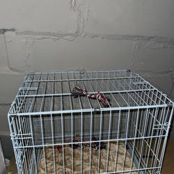 Small blue dog cage