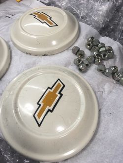 Chevy center caps wheels and new lug nut
