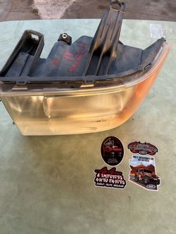 2011 GMC Sierra headlight