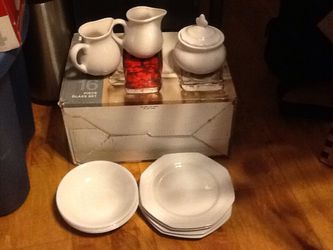 Ceramic tea set with bowls and plates