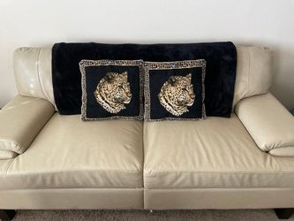 Cream-Colored Leather Loveseat Couch