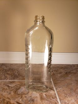 Vintage Clear flat glass bottle with 6 embossed ribs on each