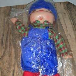 Vintage Kids Toy Doll Made In Hong Kong 14'in Tall. Packaging has some damage. Sold as is.

