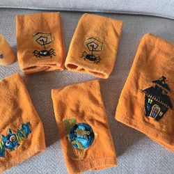 Vintage Chesapeake candle, 4 tea towels and 1 hand towel