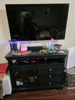 TV with TV console Storage Rack