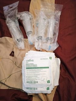 Feeding Syringes And Drain Sponges
