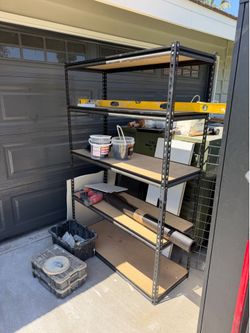 Metal framed shelving with wood shelves